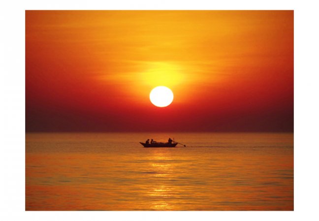 Fototapeta - Západ slnka s rybárskym člnom